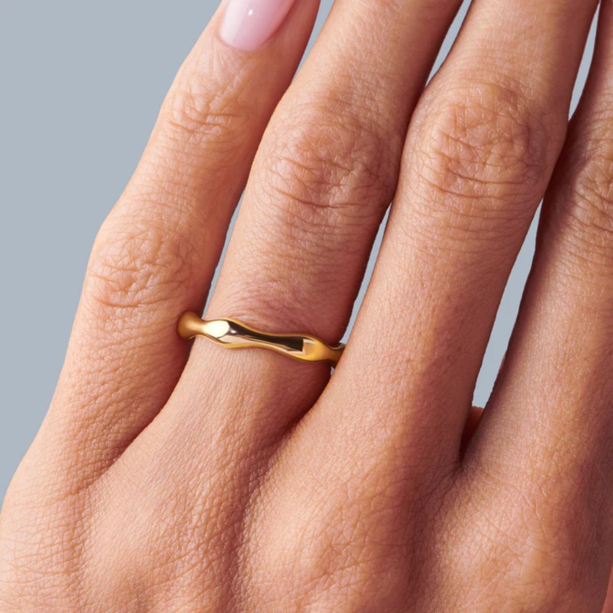 Organic Wave Stacking Ring worn on hand